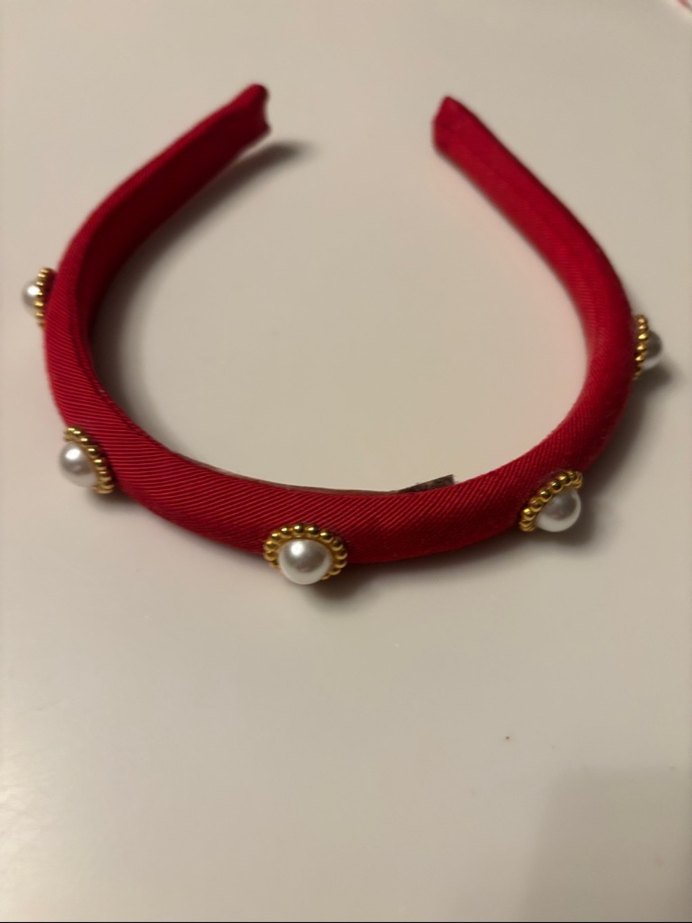 Red headband with pearls trimmed in gold